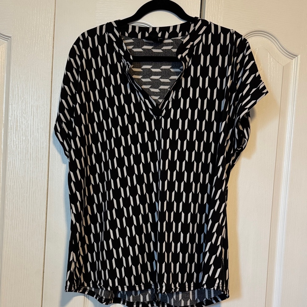 Elegant Black and White Patterned Blouse